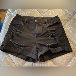 Ripped black shorts